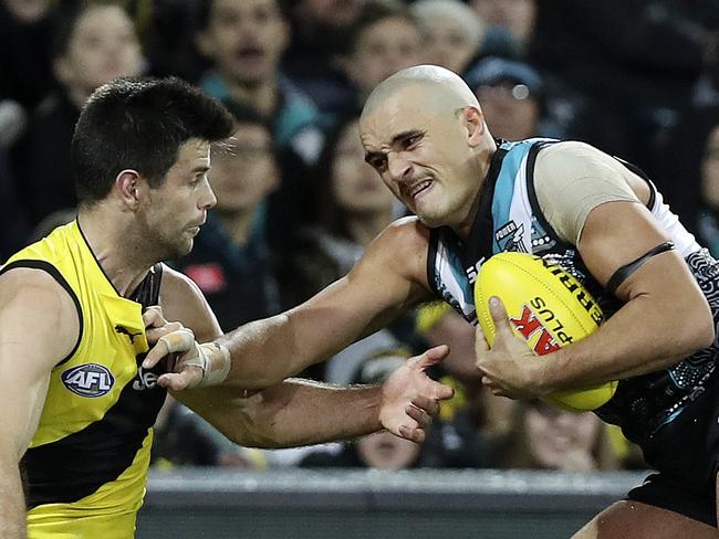 AFL - 08/06/18 - Port Adelaide v Richmond at The Adelaide Oval. Sam Powell-Pepper hands out a "Don't Argue" to Trent Cotchin. Picture Sarah Reed