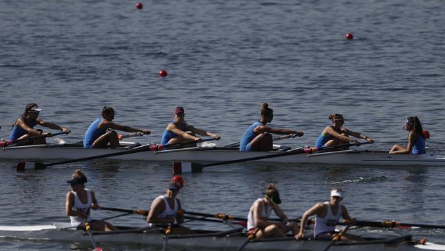 Teams of rowers from Italy, top, and the U.S., bottom, practice for the 2015 World Rowing Junior Championships.