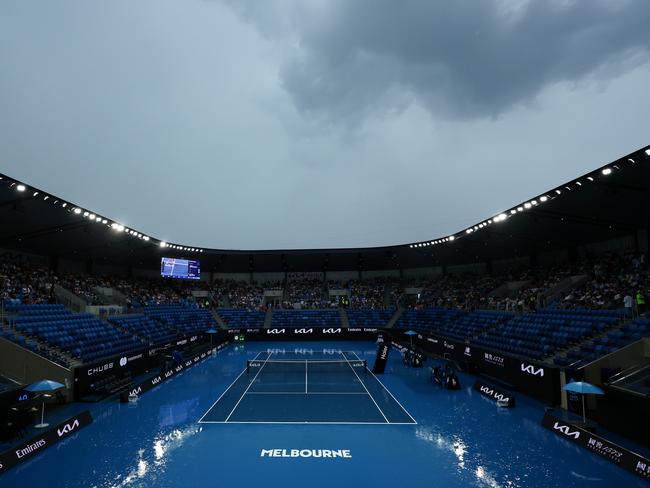 Dark clouds and rain over the Australian Open. Picture: Getty Images