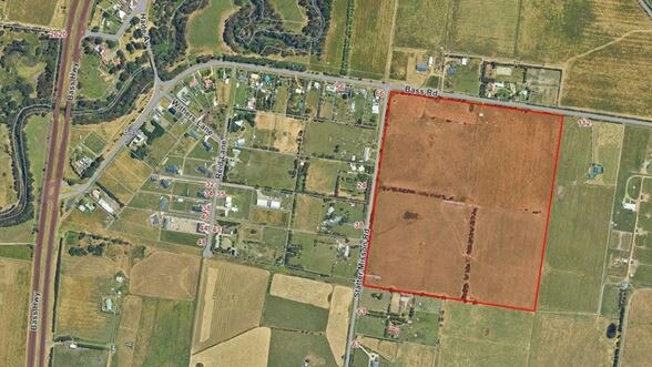 This tract of land in Bass could be become a housing development if a Melbourne-based developer gets its way.