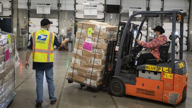 USPS workers in Portland, Oregon, began processing and mailing about 1.5 million ballots in mid-October. Picture: AFP