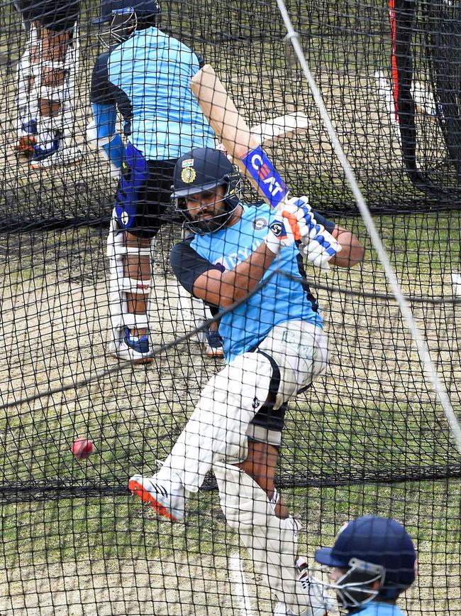 India's Rohit Sharma, centre, in the nets in Melbourne. Picture: AFP