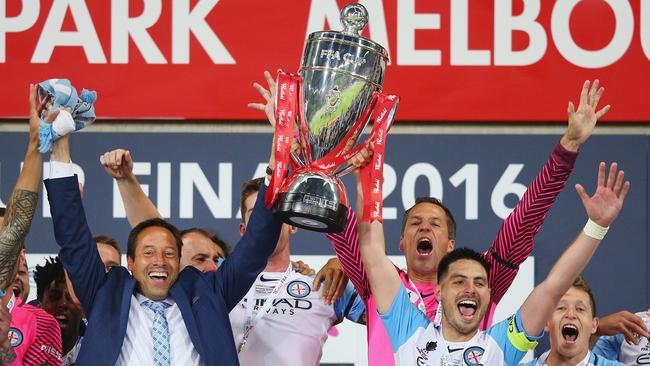 Melbourne City coach John van’ t Schip and captain Bruno Fornaroli hoist the FFA Cup in 2016. Picture: Getty Images