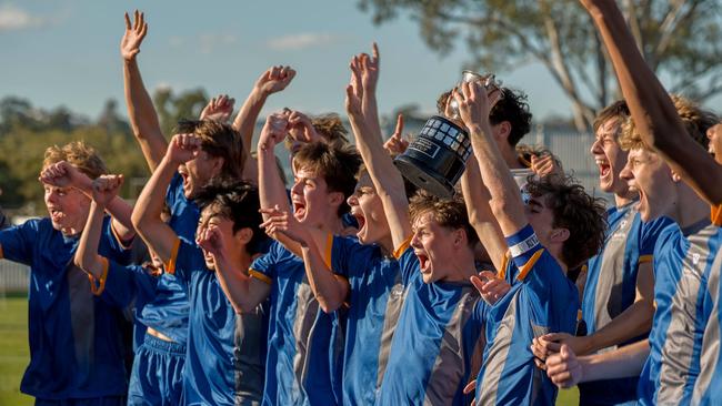 The Churchie squad celebrating the premiership. GPS First XI football action from a round 8 spectacle between hosts Churchie and visitors TSS.