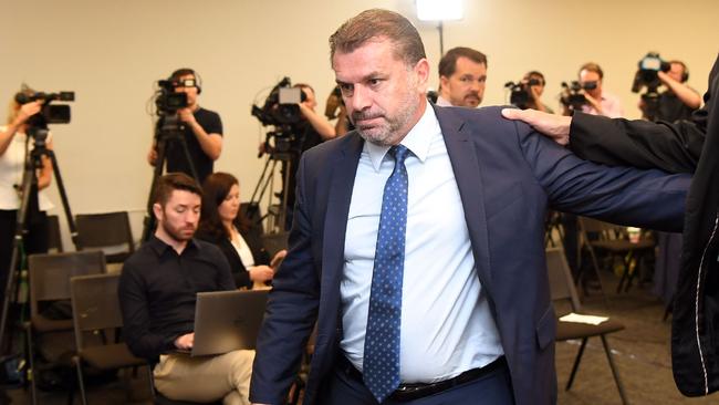 Australia's national football coach Ange Postecoglou leaves