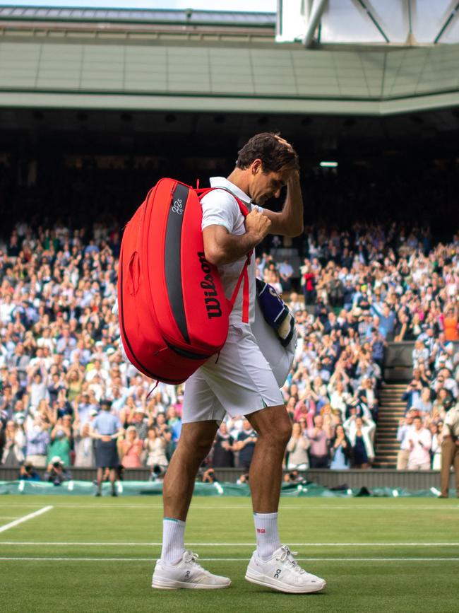 Roger Federer leaves the court after losing to Poland's Hubert Hurkacz.