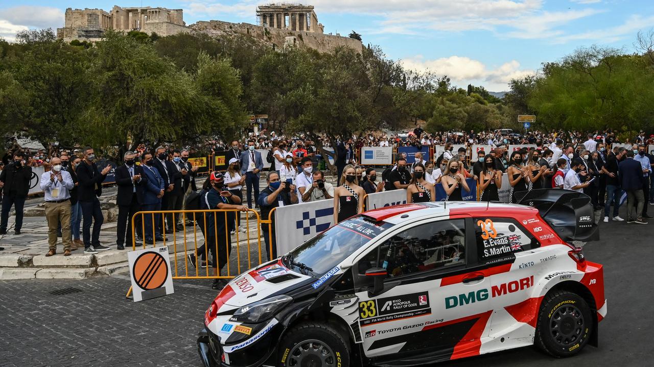 Britain's Elfyn Evans with his co-driver Scott Martin under the ancient Acropolis hill. Picture: Aris Messinis / AFP