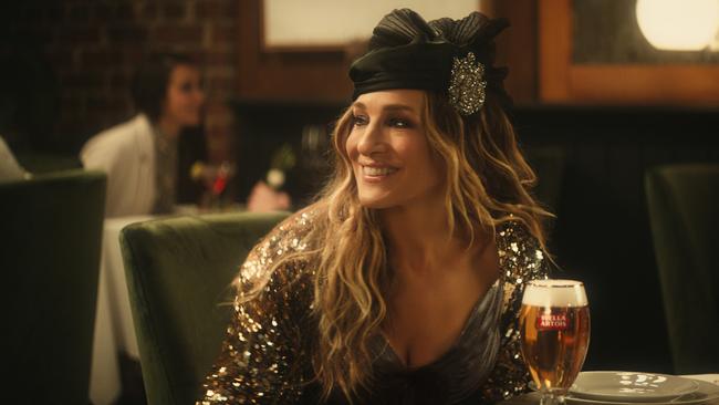 Sarah Jessica Parker appears alongside Jeff Bridges in an ad for Stella Artois beer. Picture: AP 