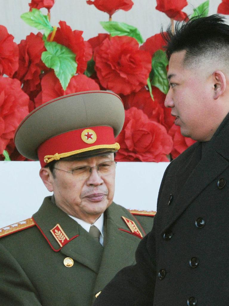 Jang Song-thaek, left, was for many years at the heart of North Korea’s power as well as being Kim Jong-un’s uncle. Picture: AP Photo/Kyodo News, File.