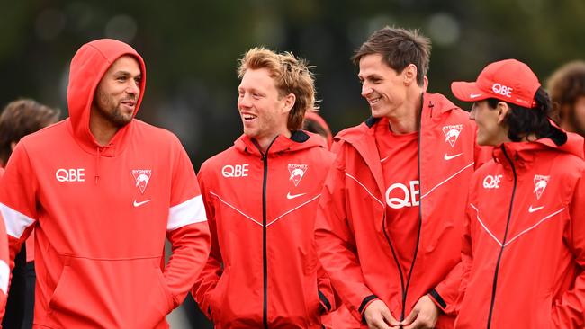 Lance Franklin, Callum Mills, Callum Sinclair and Justin McInerney chat while walking a lap at Xavier College. Picture: Getty Images