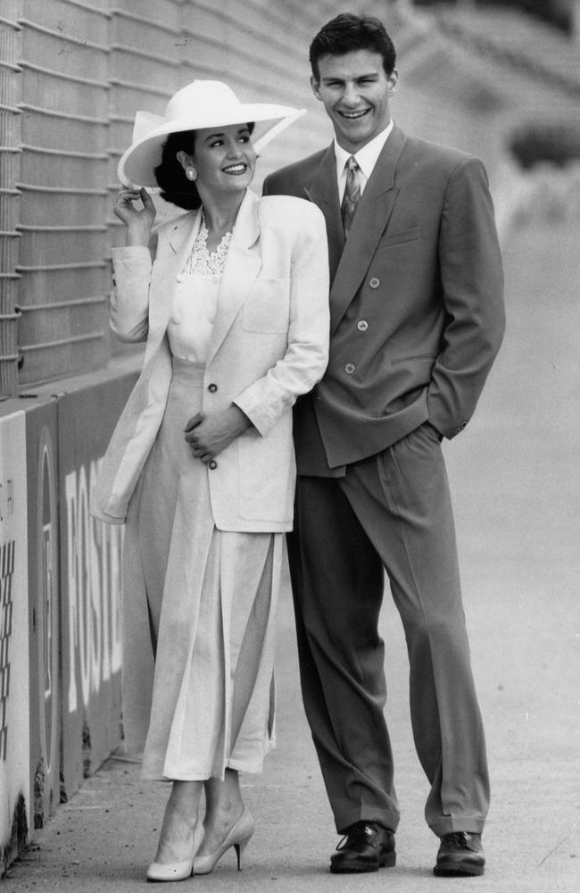 Fashion model Mark Evans (right) in a Roger David suit before the Adelaide Grand Prix in 1990. Picture: News Corp Australia