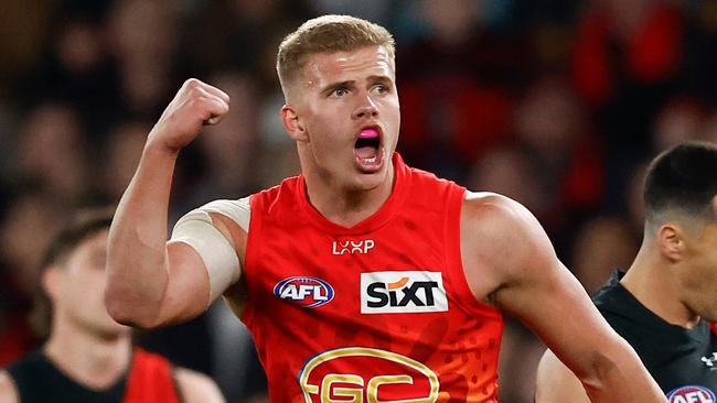 MELBOURNE, AUSTRALIA - AUGUST 10: Jed Walter of the Suns celebrates a goal during the 2024 AFL Round 22 match between the Essendon Bombers and the Gold Coast SUNS at Marvel Stadium on August 10, 2024 in Melbourne, Australia. (Photo by Michael Willson/AFL Photos via Getty Images)