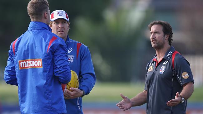 Luke Beveridge talks with Jake Stringer at Whitten Oval. Picture: Wayne Ludbey