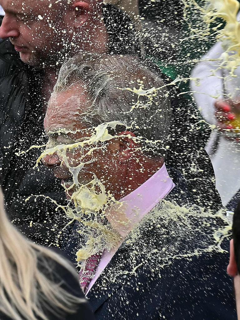 Victoria Thomas-Bowen threw a banana Macca’s thickshake over the controversial UK politician. Picture: Ben Stansall / AFP