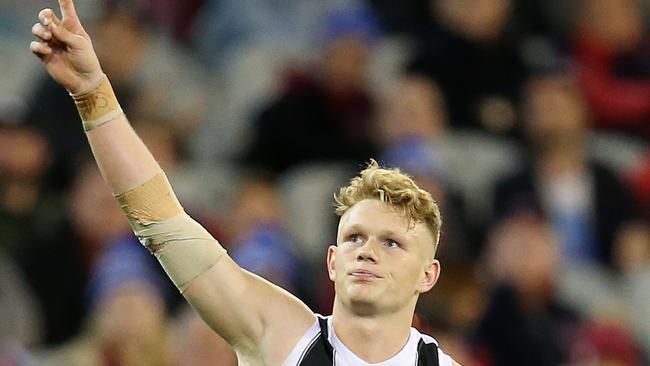 Collingwood's Adam Treloar celebrates his final-term goal. Pic: Michael Klein