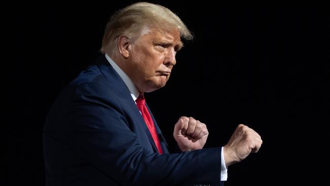 US President Donald Trump dances at the end of a Make America Great Again rally as he campaigns in Gastonia, North Carolina on October 21. Picture: Getty