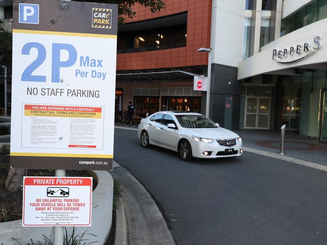 Signage including ‘terms and conditions’ at the entrance to Oracle Boulevard at Broadbeach. Picture: Glenn Hampson.