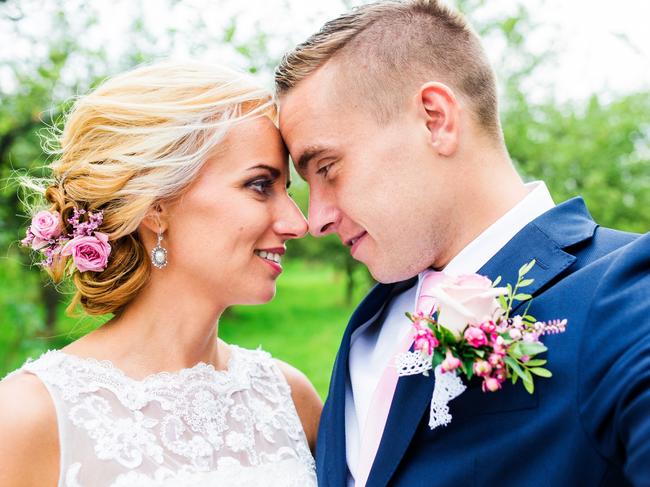 Generic photo of a bride and groom shooting a selfie. Picture:  iStock     (wedding)