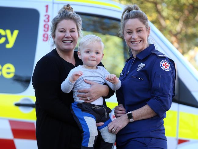 Jasmin Reynolds with her son Beau and paramedic Belinda Boothroyd. Belinda treated Beau after he burnt himself with boiling water. Picture: Sam Ruttyn