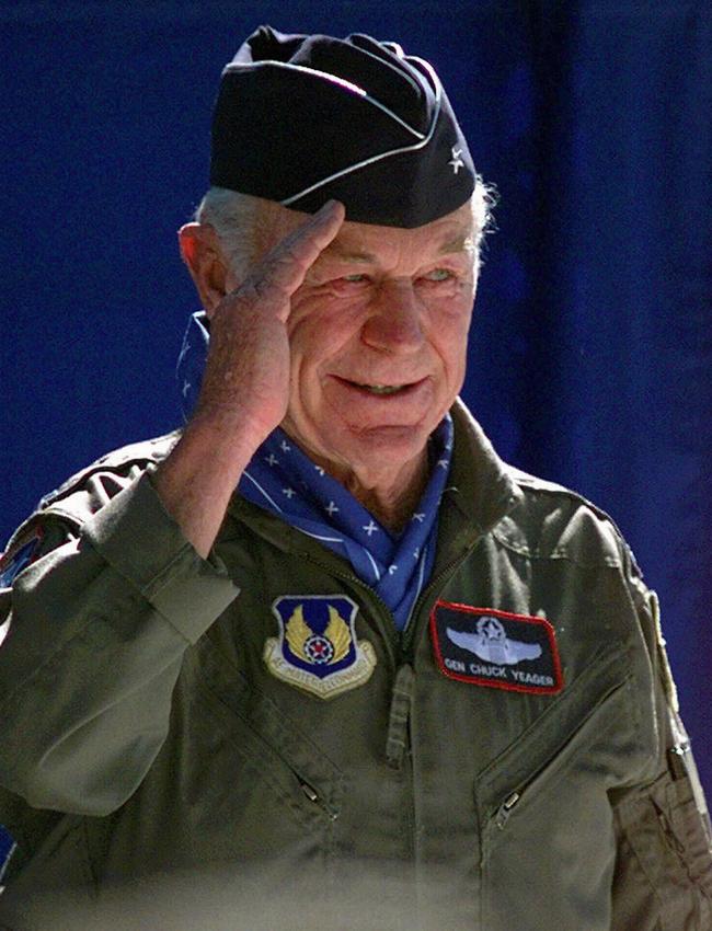 USAF Brigadier General Chuck Yeager salutes the crowd at Edwards Air Force Base, California, on October 14, 1997, after flying in a F-15D jet fighter plane breaking the sound barrier once again during 50th anniversary of supersonic flight. Picture: AP