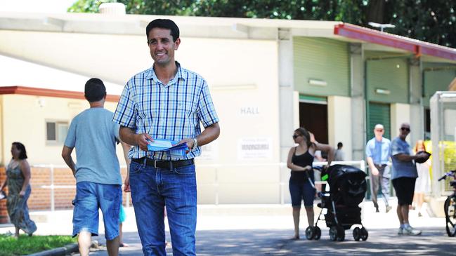 David Crisafulli in 2015, handing out how to vote cards at Mundingburra State School. Picture: Zak Simmonds