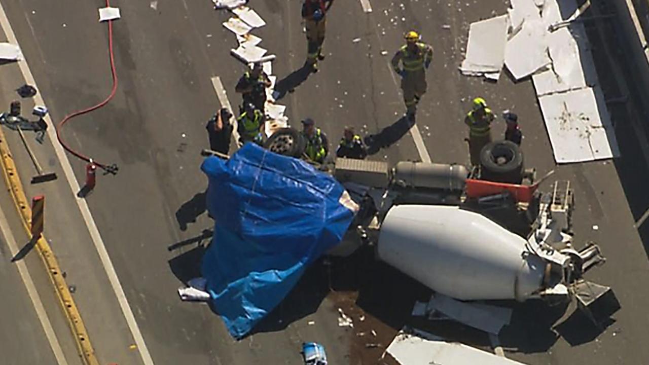 A﻿ driver has been killed after a cement truck crashed and rolled on a Melbourne freeway this afternoon. Picture: 9 News