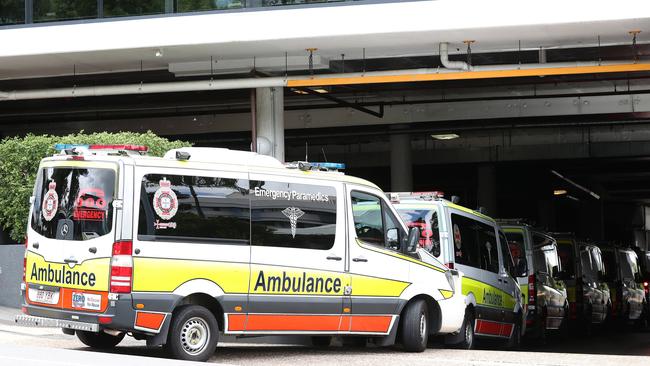 Guests in quarantine at Brisbane’s Hotel Grand Chancellor getting transported in ambulances to other hotels. Photo: Tara Croser