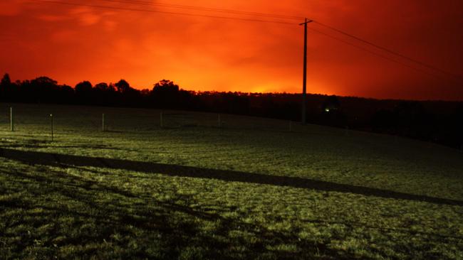 Bushfires light up the sky in East Gippsland. Picture: Brodie Richardson