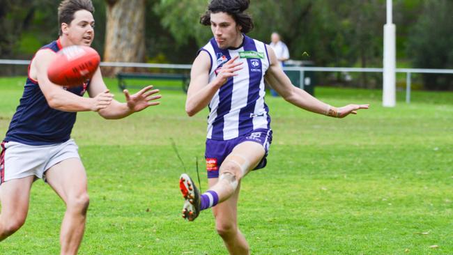 Nathan Byrnes (right) and his CBC Old Collegians teammates kicked themselves well and truly into the division five grand final last Saturday. Picture: AAP Image/Brenton Edwards.