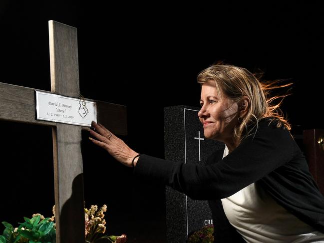 ROYAL COMMISSION ANNOUNCED FOR THE AUSTRALIAN MILLITARY. Julie-Ann Finney at the Golden Grove Cemetery gravesite of her son David Finney who took his own life after 20 years in the Navy. She received a call from Prime Minister Scott Morrison who told her of the Royal Commission announcement. Picture: Tricia Watkinson