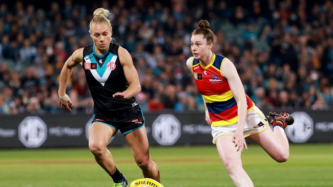 Port Adelaide’s Erin Phillips competes with Adelaide’s Sarah Allan during the inaugural AFLW Showdown in September, which the Crows won by 60 points. Picture: James Elsby/AFL Photos via Getty Images