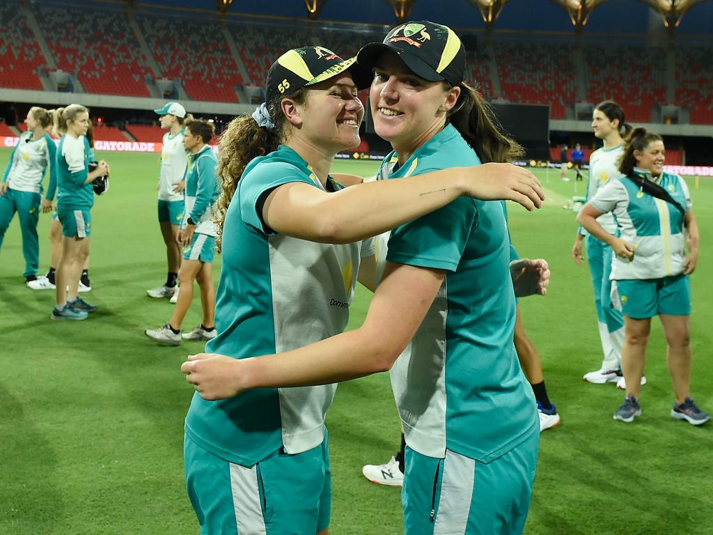 Hannah Darlington and Tahlia McGrath embrace after receiving their debut T20 international caps. Picture: Getty Images