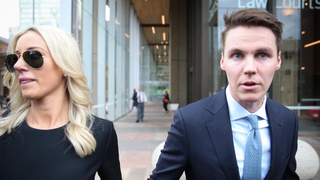 Roxy Jacenko wears two-piece and Louis Vuitton belt supporting husband  Oliver Curtis at court