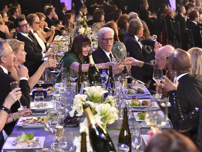 Cheryl Hines, Mary Steenburgen, Ted Danson, and Larry David toast at the 24th annual Screen Actors Guild Awards in Los Angeles. Looking on at left is Robert F. Kennedy, Jr. Picture: AP