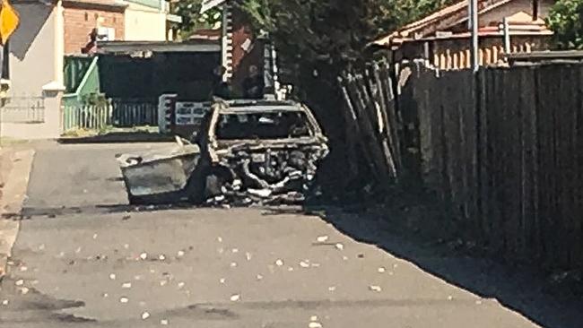 A burnt-out car was found one kilometre away from the shooting. Picture: Nick Hansen