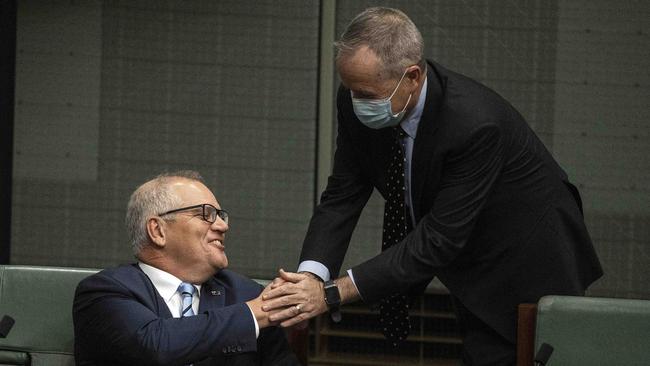 Former foes share a handshake and a laugh before the start of question time. Picture: NCA NewsWire / Gary Ramage