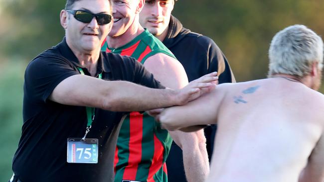 Barry Hall could only laugh when approached by a streaker at the end of his one-off game for The Basin. Picture: Alex Coppel.