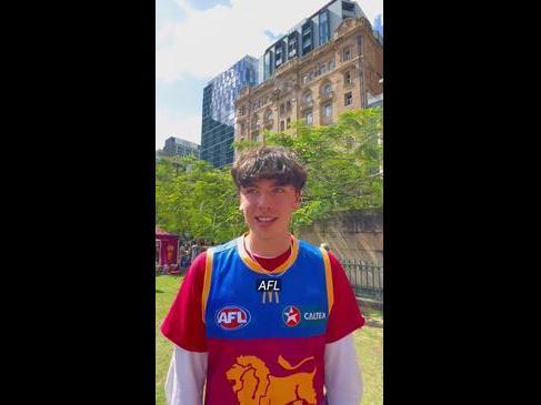 Brisbane lions fans celebrate with premiers in Brisbane City