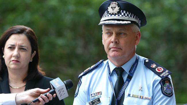 Ross Barnett when he was in the QPS pictured with then-Premier Annastacia Palaszczuk.
