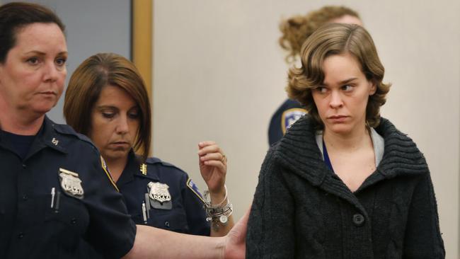 Lacey Spears is escorted into the courtroom at the Westchester County Courthouse, New York, on Tuesday. She is charged with the depraved murder and manslaughter of her son, five-year-old Garnett-Paul Spears. Picture: AP/The Journal News, Ricky Flores