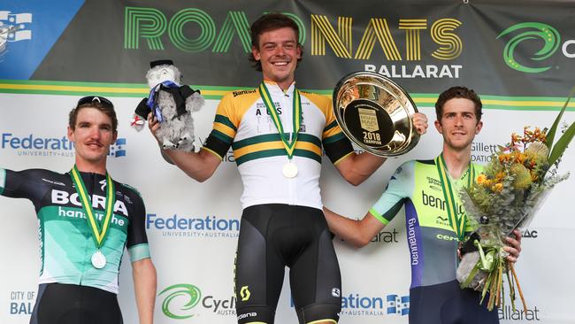 Chris Harper (right) with Jay McCarthy and Alex Edmondson on the podium of the road race at the national championships in 2018. Picture: Con Chronis.