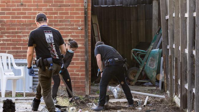 Viper force members remove a tiny house from the Hells Angels clubhouse in Alphington. Picture: Jason Edwards