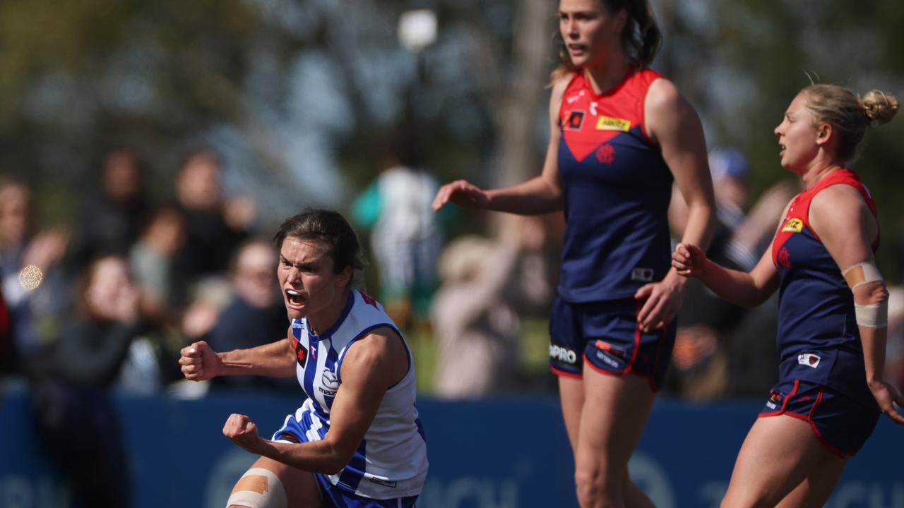 North Melbourne star Ash Riddell celebrates one of her two goals against Melbourne at Casey Fields on Sunday. Picture: Daniel Pockett / Getty Images