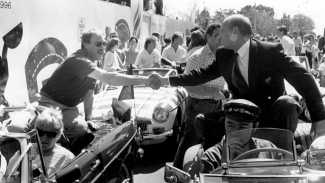 Coaches Malcolm Blight and Allan Jeans shake hands during the 1989 grand final parade.