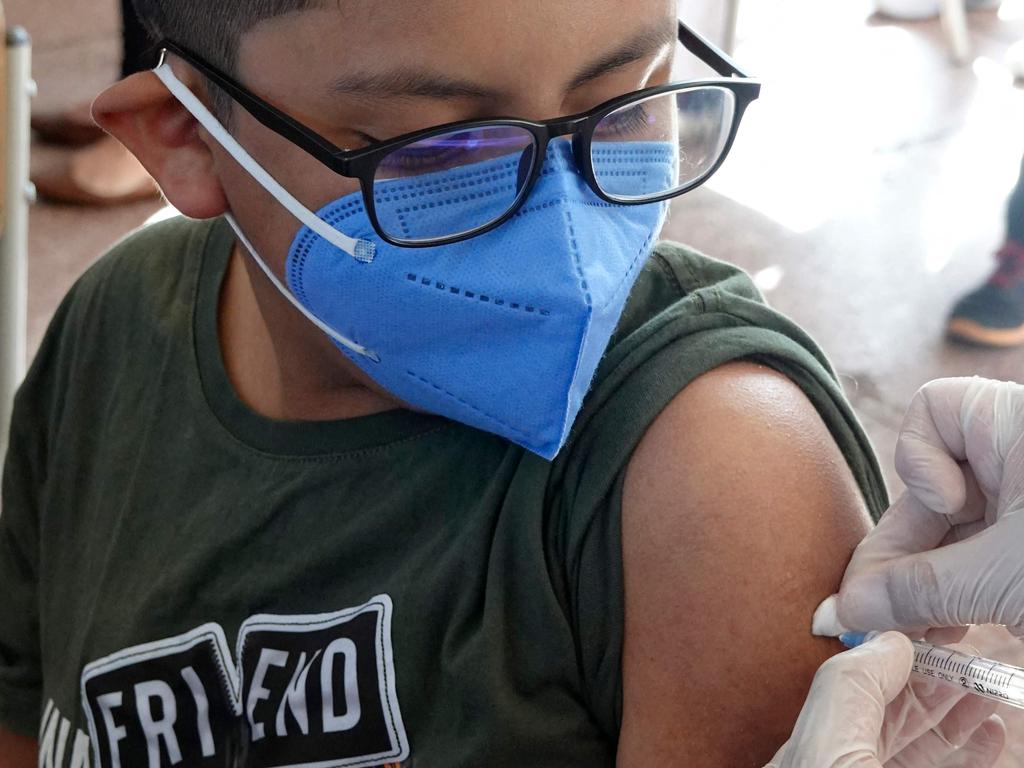 A child receives the Covid vaccine. Picture: AFP