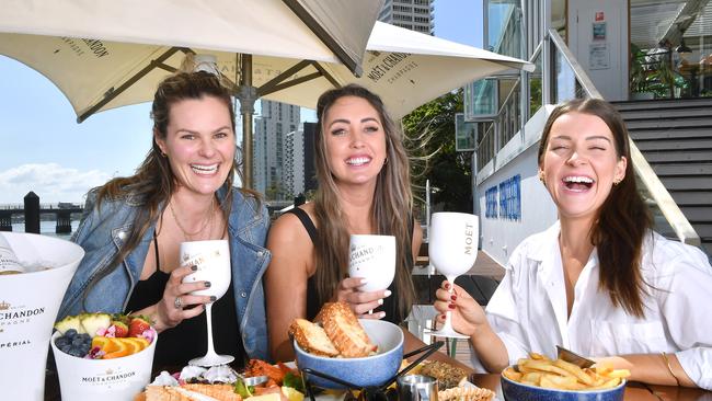 Megan Hugh, Bree Maloney and Kate Sloan at the new Surfers Pavilion Jetty. Picture: John Gass