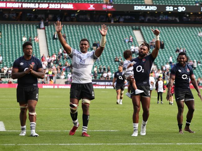 Fiji players celebrate after their historic victory over England. Picture: David Rogers/Getty Images