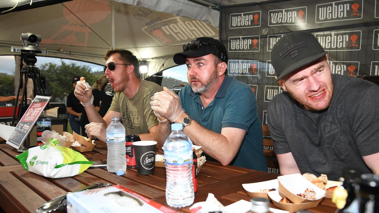 Adam Hamilton, Matt Diesel and Madison Rodier take part in the Weber Chilli tasting competition. Meatstock Festival at the Toowoomba showgrounds. April 2022