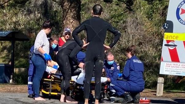 Paramedics attend to Ms Doyle after the attack. Picture: Supplied