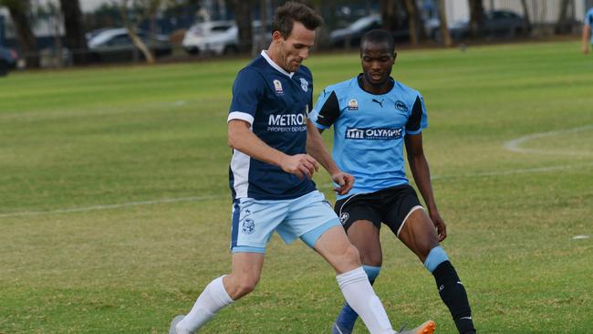 Vipers Augustus Williams (r) and Noarlunga's Alban Martini in 2019 . (AAP Image/Brenton Edwards)